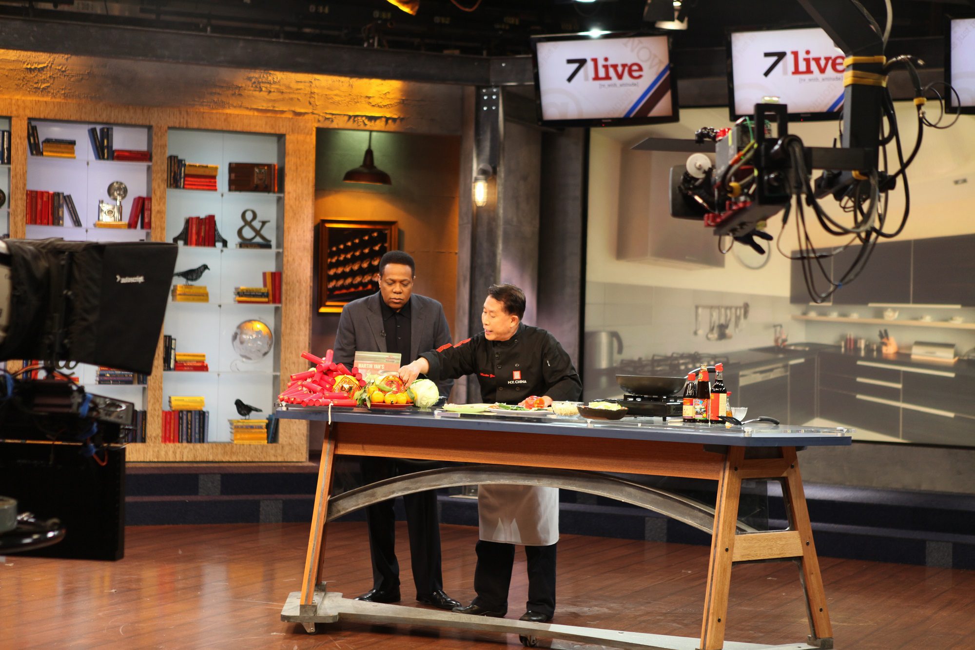 Martin Yan filming a cooking segment in an ABC television studio