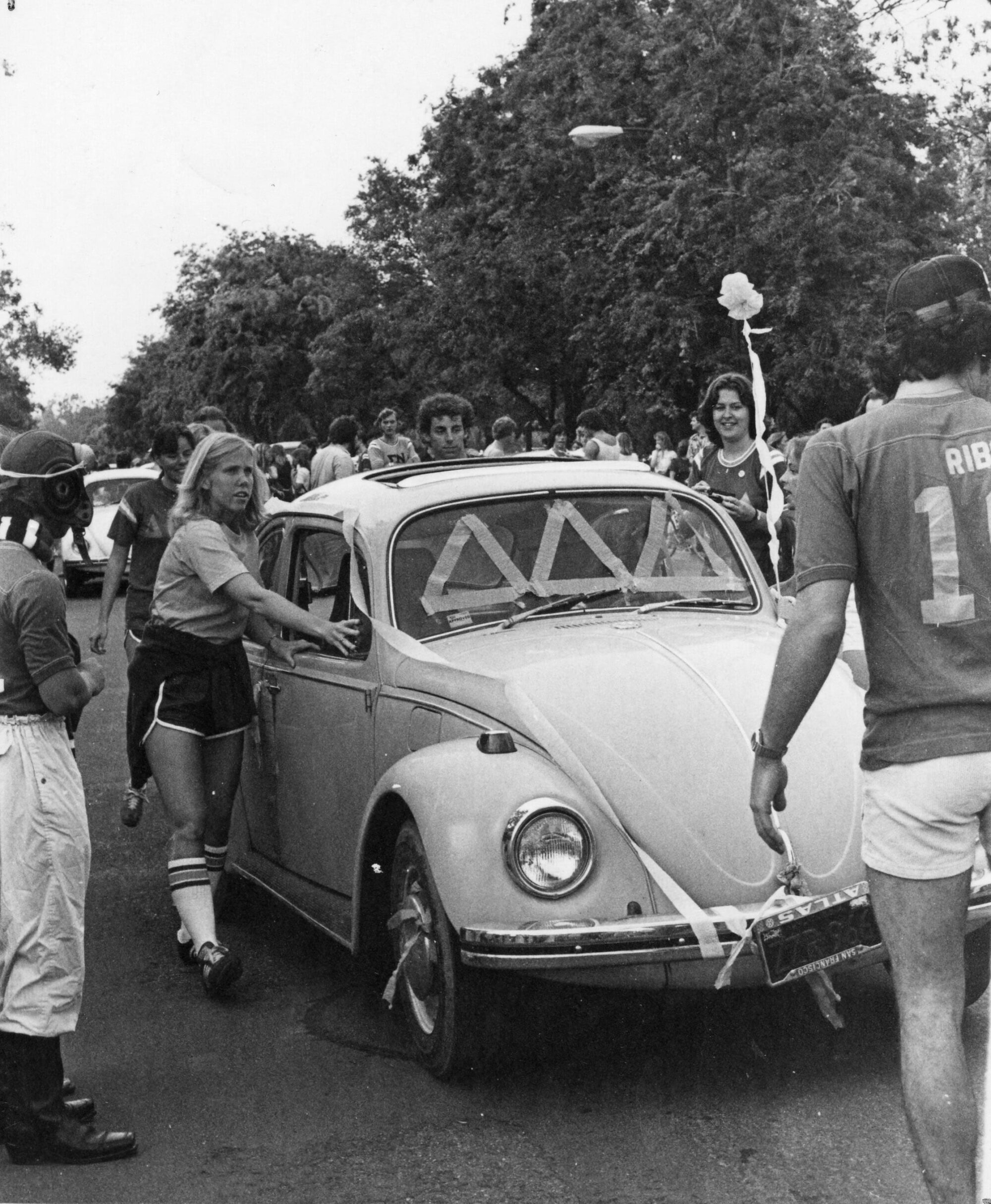 VW Bug car decorated with paper streamers