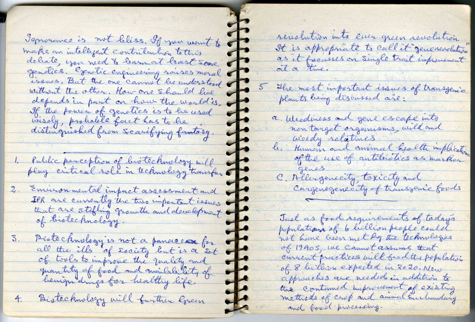 Two pages of a handwritten entry in a spiral bound notebook.