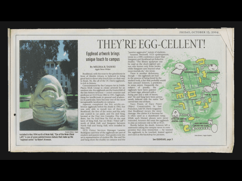 Newspaper clipping featuring a photo of the "Eye on Mrak" Egghead sculpture and a map of where all the Eggheads are located. 