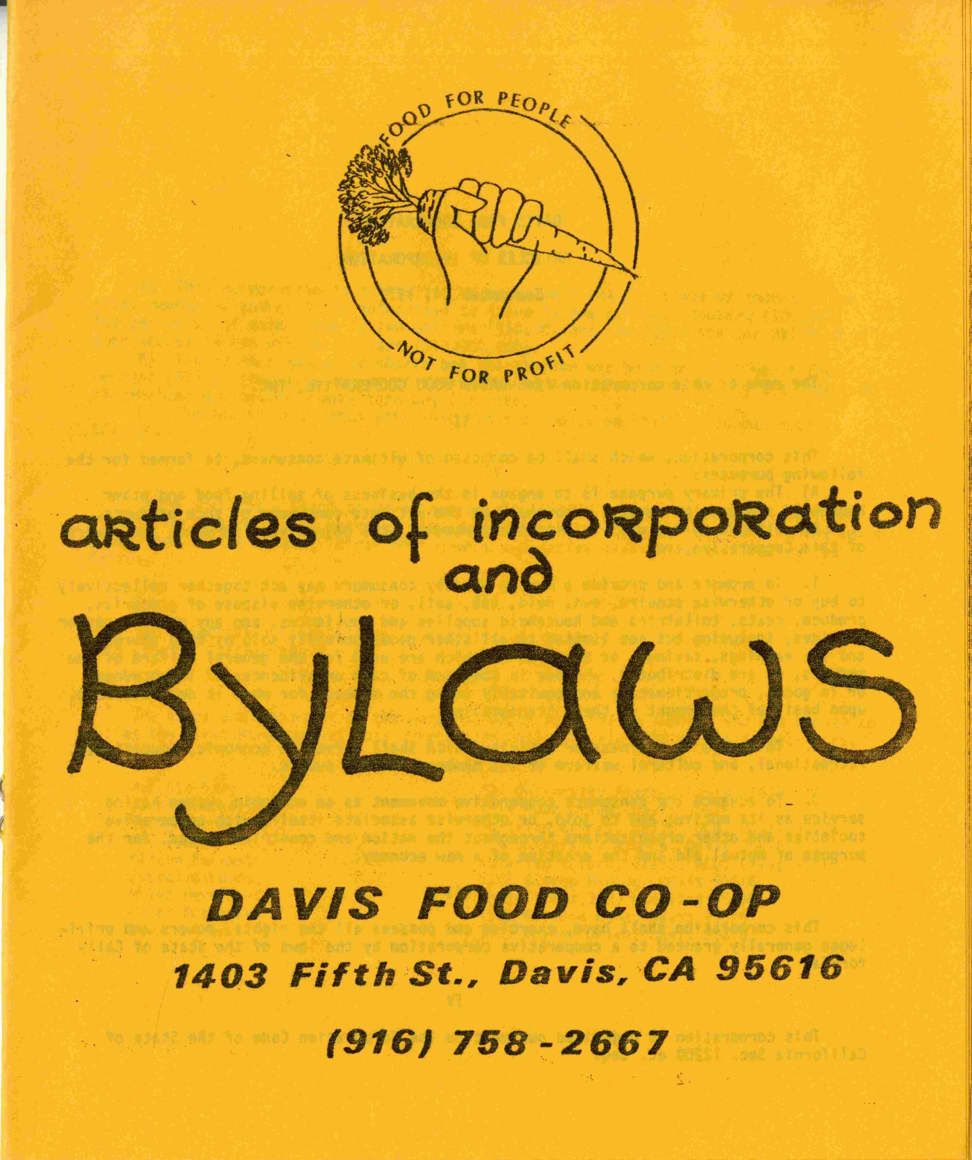 Orange-yellow cover of the original "articles of incorporation and bylaws" for the Davis Food Co-op