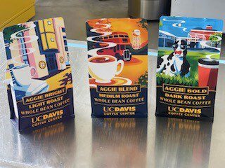 Three bags of coffee from UC Davis - light, medium, and dark roasts -