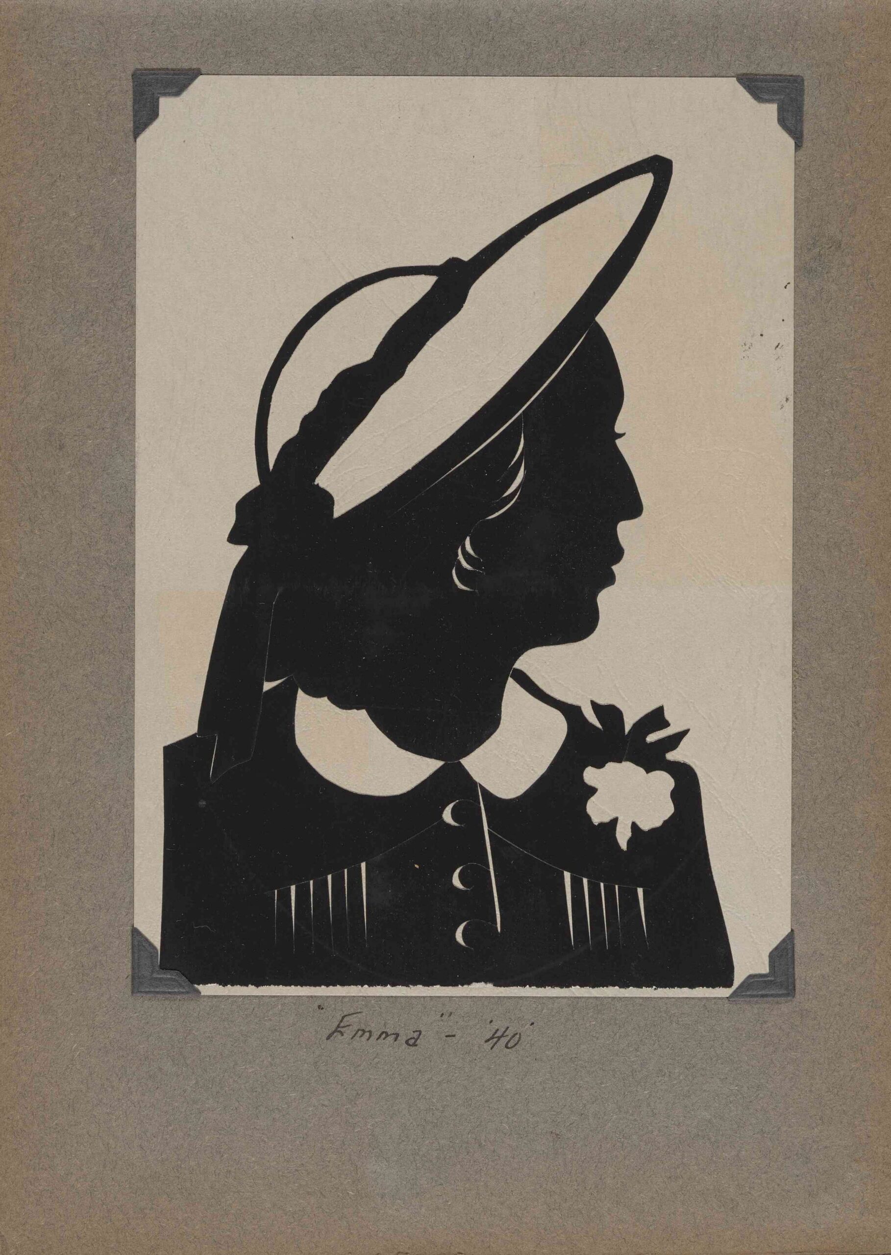 A silhouette portrait of a woman facing to the right.