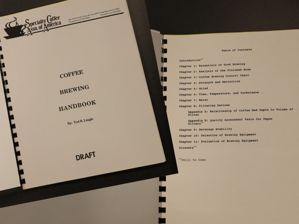 Two photos of a plastic-spiral-bound copy of the Coffee Brewing Handbook by Ted R. Lingle, showing its title page and table of contents.